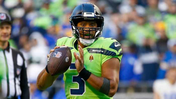 Seattle Seahawks quarterback Russell Wilson (3) looks to pass against the Los Angeles Rams during the second quarter at Lumen Field.